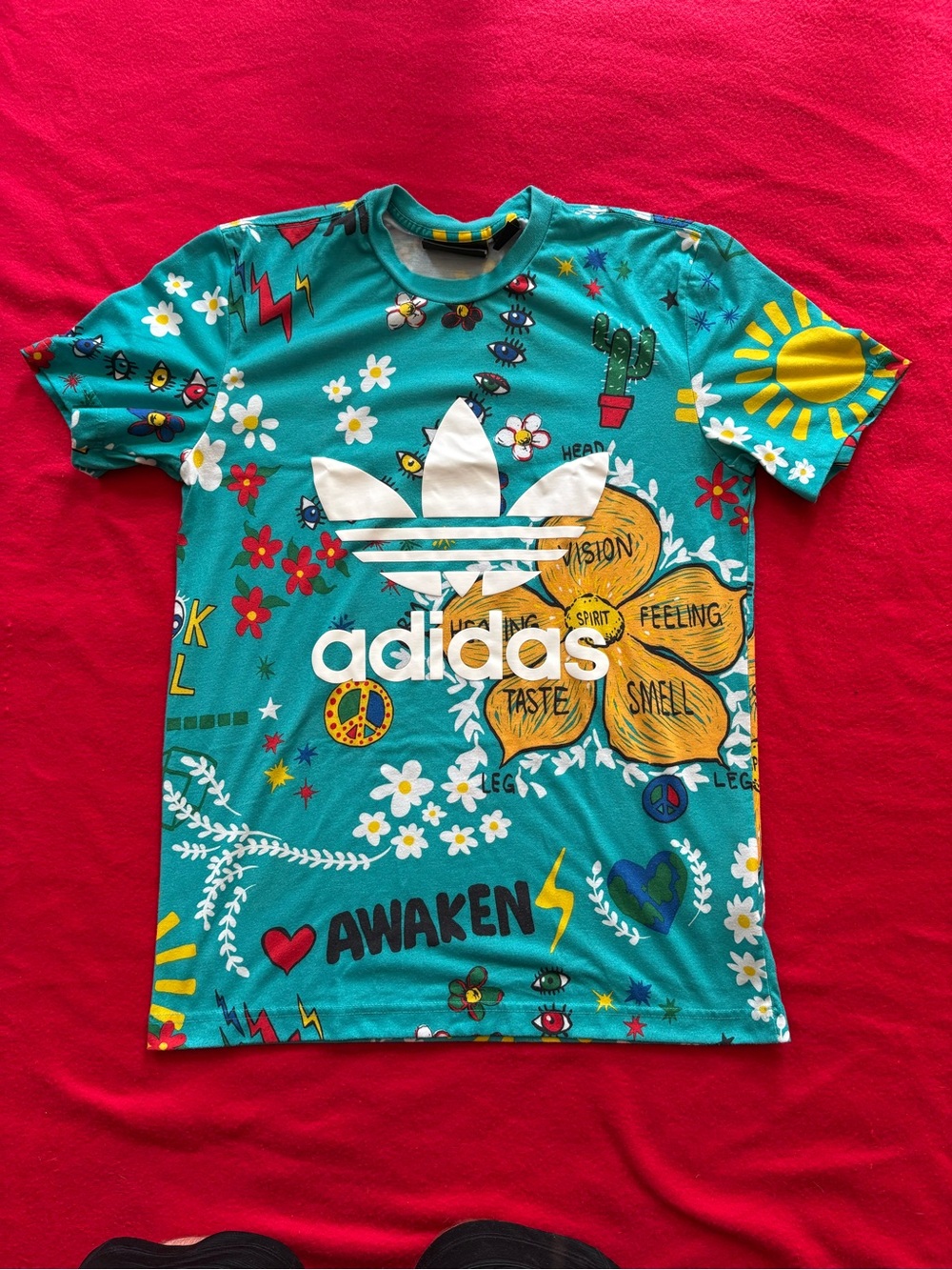 adidas Teal Graphic Tee with Multicolor Floral Prints,